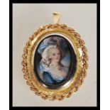 An 18ct gold / 750 marked portrait necklace pendant. The portrait miniature with inset diamonds