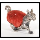 A 19th Century Victorian silver plated novelty pin cushion depicting a squirrel in the manner of