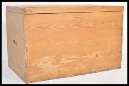 A 19th Century Victorian scrubbed pine blanket box chest of large proportions having a hinged top