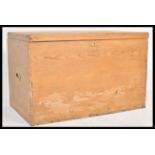 A 19th Century Victorian scrubbed pine blanket box chest of large proportions having a hinged top