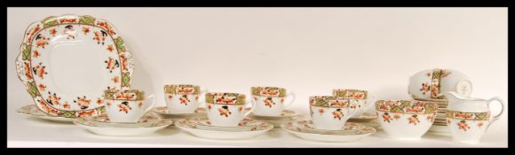 A 20th Century Sutherland fine English bone china tea service consisting of two large cake plates,