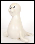 An early 20th Century Art Deco Wade Heath Walt Disney ceramic figurine of Sammy the Seal in the rare