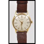 A vintage retro 20th Century 1960's Roamer wrist watch having a champagne dial with gilt baton