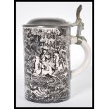 A 19th Century Continental transfer printed stein, the stein decorated with a hunting scene