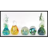 A group of five 20th Century Mdina studio art glass paperweights to include a pair of seahorse