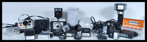 A collection of film photographic equipment to include a selection of film cameras such as Ilford