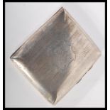 An early 20th Century Edwardian cigarette case by Joseph Gloster. The cheroot case of square cushion