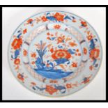 A 19th Century Chinese Imari porcelain charger plate of fine quality having hand painted floral