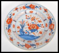 A 19th Century Chinese Imari porcelain charger plate of fine quality having hand painted floral