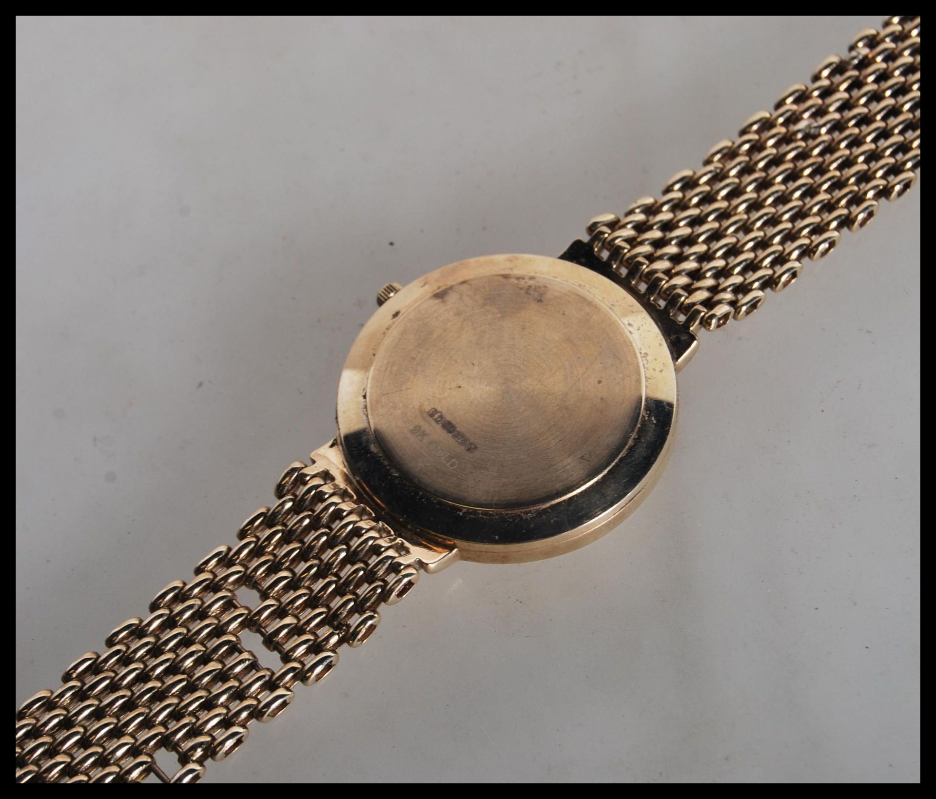 A boxed Rotary Elite 9ct gold gents watch set to a 9ct gold mesh watch bracelet strap. The white - Bild 4 aus 5