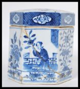 An early 19th Century Chinese porcelain blue and white tea caddy and lid / cover of hexagonal form