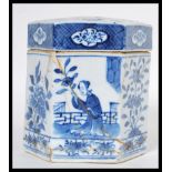 An early 19th Century Chinese porcelain blue and white tea caddy and lid / cover of hexagonal form