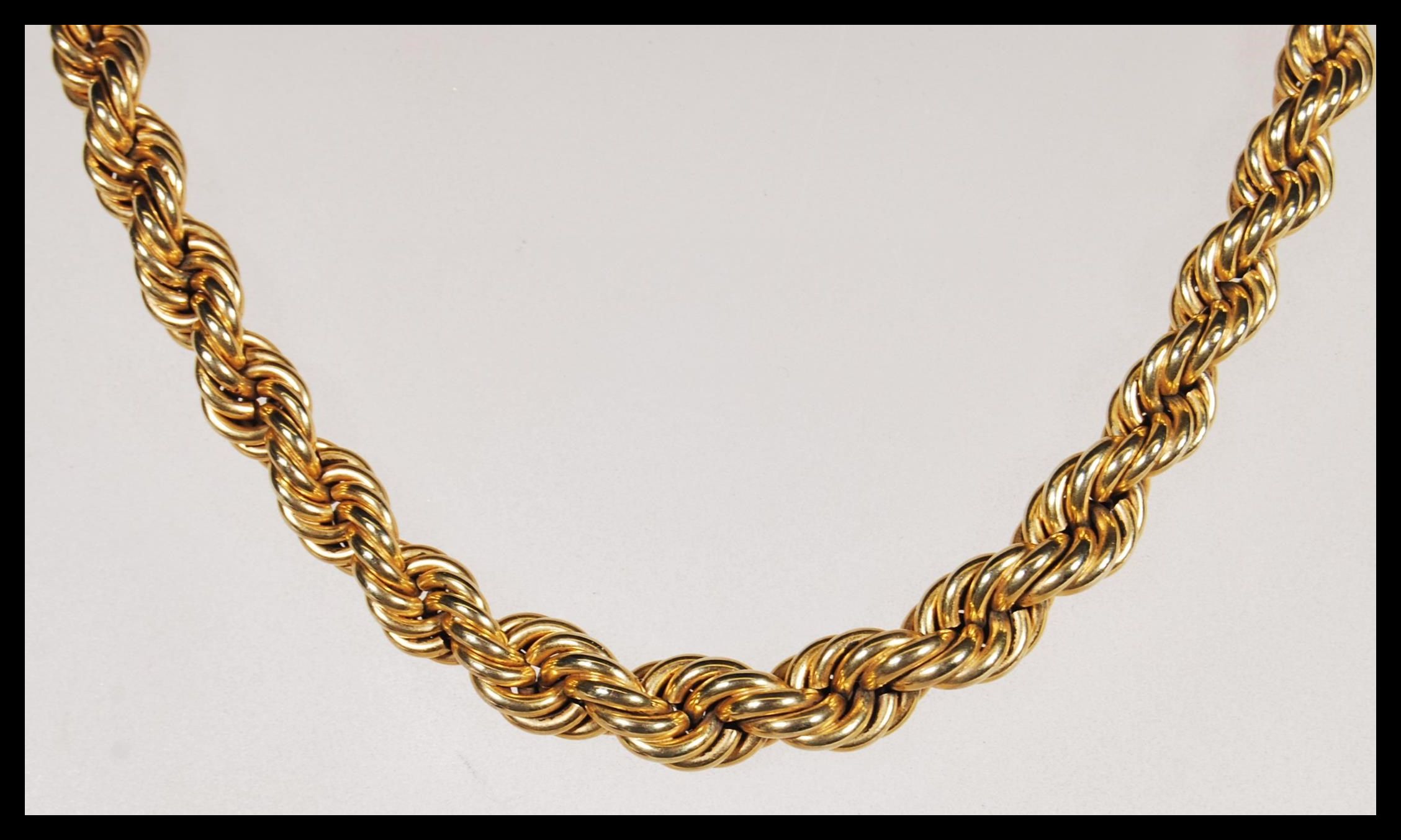 A hallmarked 9ct gold rope twist necklace chain of graduating form having bolt ring clasp.