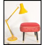 A vintage retro 20th Century 1001 Lamps orange anglepoise industrial desk lamp along with a
