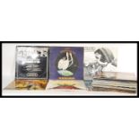 A large collection of vinyl long play / LP records featuring various artists to include The