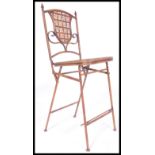 A 20th century country house style folding tennis umpires chair. The painted metal frame with