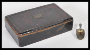A late 18th / early 19th Century Georgian lacquered snuff pot of rectangular form, the hinged