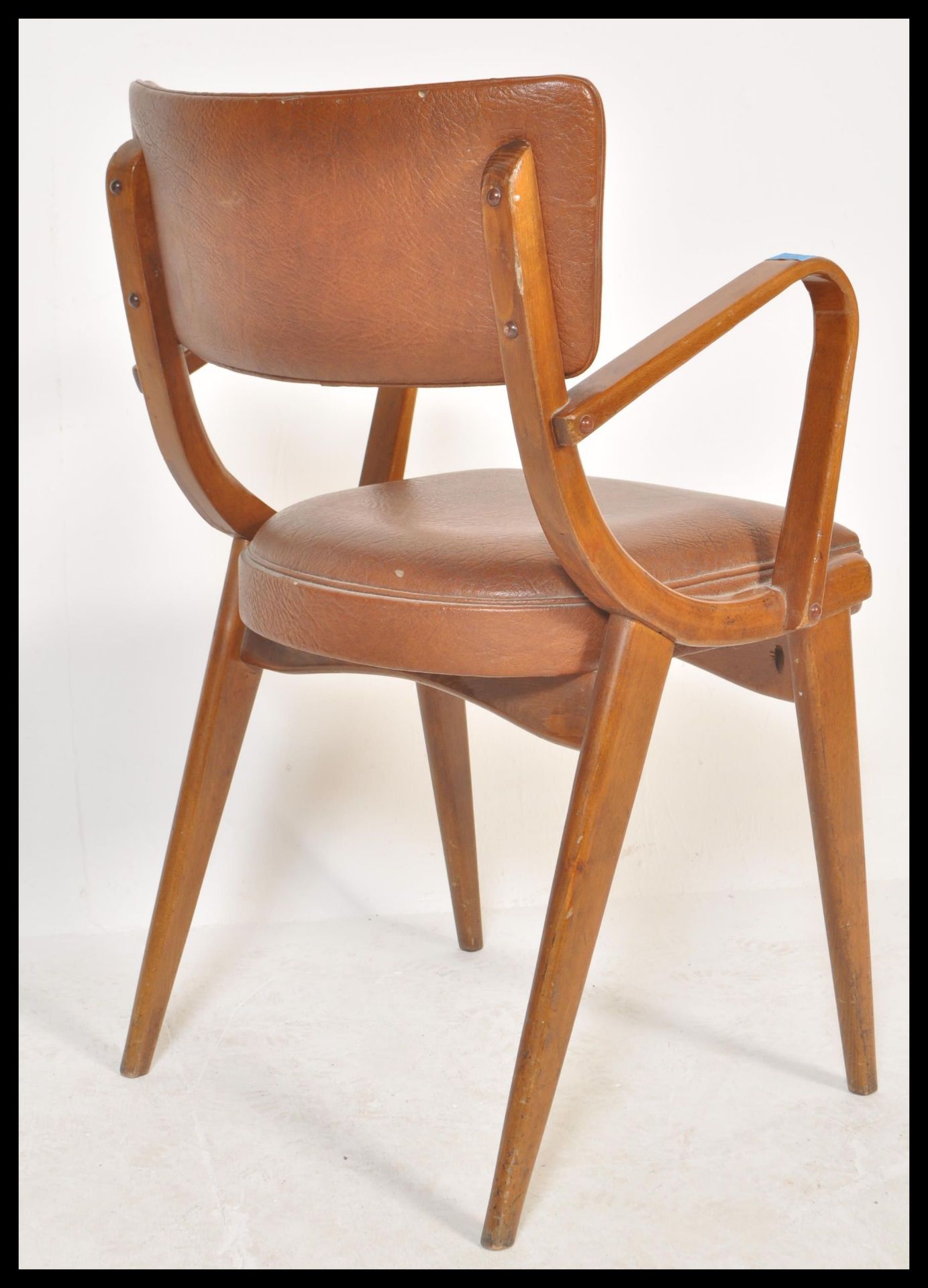 A vintage retro 20th Century Ben Chairs armchair raised on shaped angular legs with leather / faux - Bild 5 aus 5