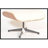 After Charles & Ray Eames - Plycraft - A contemporary lounge chair ottoman comprising of