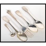 A group of hallmarked silver flatware dating from the early 19th Century to include Robert