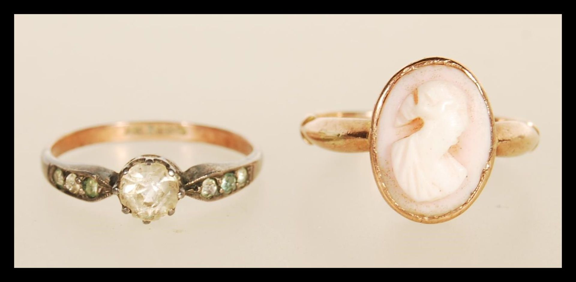 A hallmarked 9ct gold ring set with a pink and white stone oval cameo, hallmarked Birmingham 1967 (