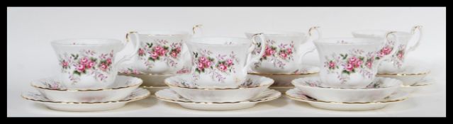 A Royal Albert fine English bone china six person tea service in the Lavender Rose pattern