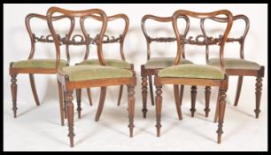 A fine set of six 19th Century rosewood balloon back dining chairs (4 + 2 near matching). The chairs