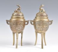 A PAIR OF 19TH CENTURY CHINESE BRONZE CENSERS WITH FO DOG FINIAL LIDS