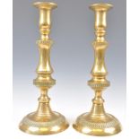 A PAIR OF 19TH CENTURY VICTORIAN BRASS ALTAR CANDLESTICKS