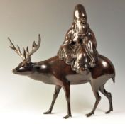 EARLY 20TH CENTURY BRONZE SHOU LAO ON STAG INCENSE