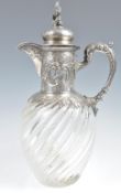 19TH CENTURY GERMAN SILVER AND GLASS CLARET JUG
