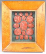19TH CENTURY FRAMED COLLECTION OF RED WAX SEALS.