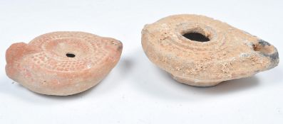 TWO ANCIENT ROMAN OIL LAMPS