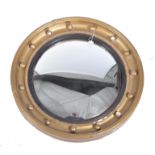 19TH CENTURY REGENCY GILTWOOD & COMPOSITE CONVEX WALL MIRROR