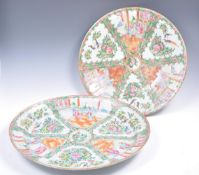 PAIR OF CHINESE FAMILLE ROSE CHARGER PLATES OF OVAL AND CIRCULAR SHAPE.