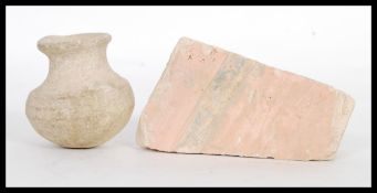 TWO ANCIENT EGYPTIAN ARTEFACTS TO INCLUDE A PLASTER FRAGMENT OF A WALL FRESCO