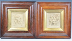 A PAIR OF 19TH CENTURY GRAND TOUR PLASTER PANELS IN FRAMES