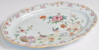 AN 18TH CENTURY CHINESE FAMILLE ROSE OVAL DISH.
