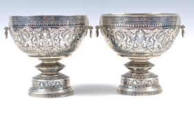 A PAIR OF EARLY 20TH CENTURY THAI SILVER WINE GOBLETS.