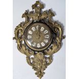 19TH CENTURY GILT METAL FRENCH ORMULU WALL CLOCK WITH FIGURAL MASKS