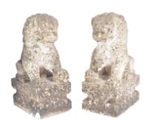 A PAIR OF BELIEVED 18TH CENTURY WHITE MARBLE CHINESE TEMPLE FOO LIONS