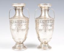 A PAIR OF VICTORIAN HALLMARKED SILVER URN VASES BY RH HALFORD & SONS.