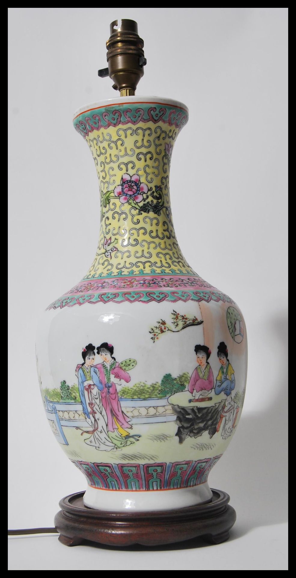 A 20h Century Chinese vase table lamp raised on socle wooden base having white cartouche body