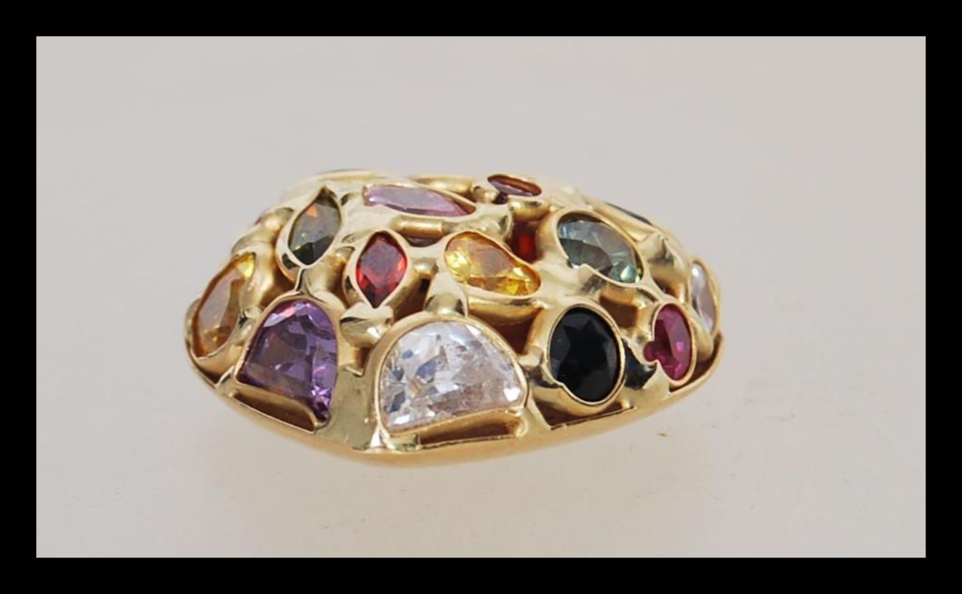 A stamped 750 gold pendant in the shape of a heart set with multi cut coloured stones. Weight 5. - Image 2 of 4