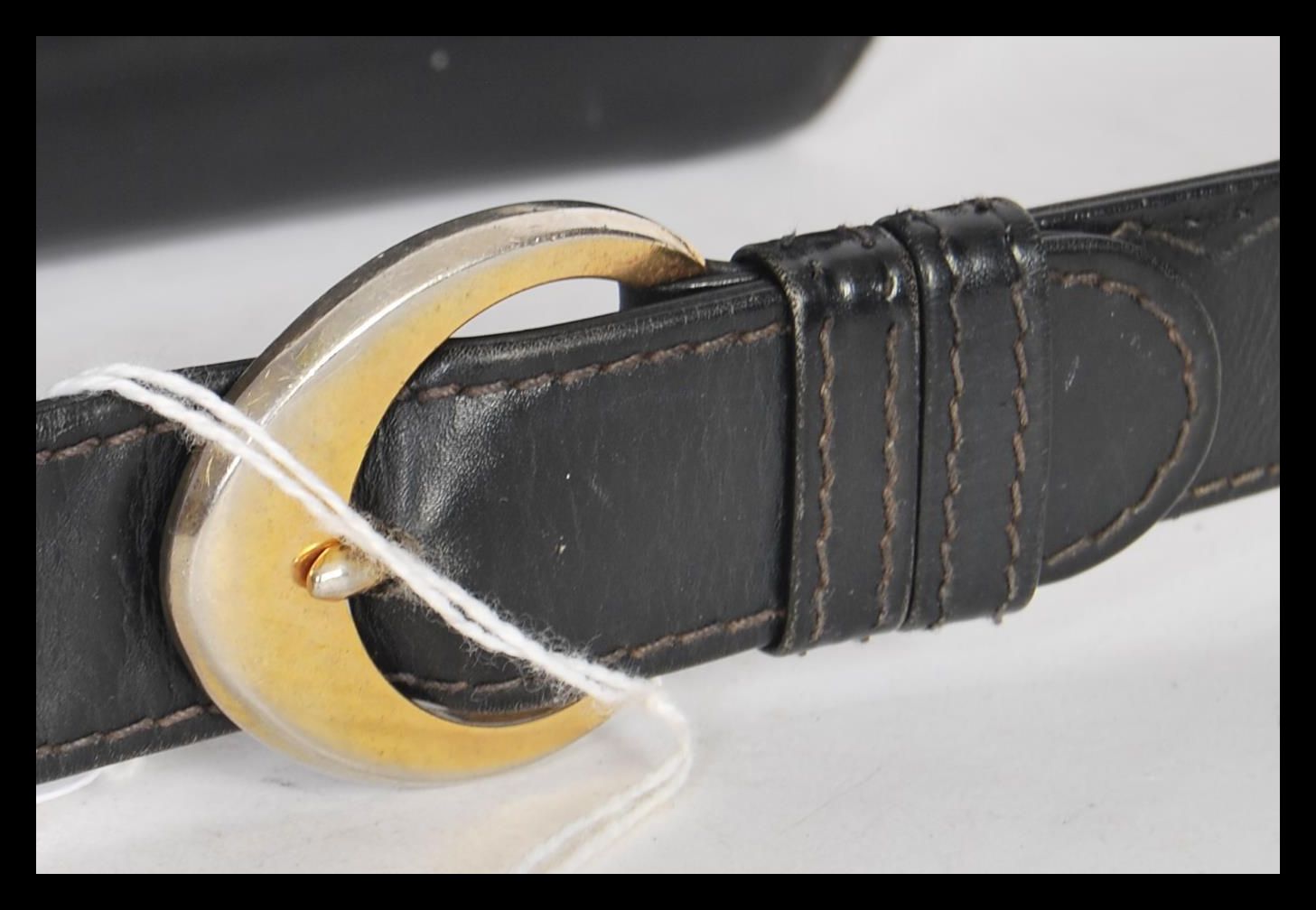 A 20th Century original designer Gucci black leather handbag with gilt metal interlocking G clasps - Image 3 of 6