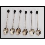 A set of six early 20th Century hallmarked silver coffee bean tea spoons by Henry Williamson Ltd