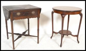 A late 19th Century drop flat mahogany occasional table with single fitted drawer raised on barrel