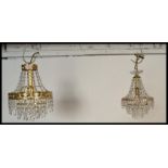 A near pair of  20th Century cut glass droplet beaded and gilt brass light fixtures,