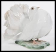 A 20th Century Rosenthal porcelain figurine figure entitled Courting Dove / Pigeon by Fritz