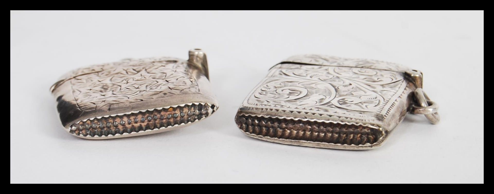 Two early 20th Century hallmarked silver vesta match cases having engraved scrolled decoration - Image 3 of 4